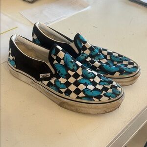 Vans Black and White Checkerboard Slip-Ons with Blue Butterflies